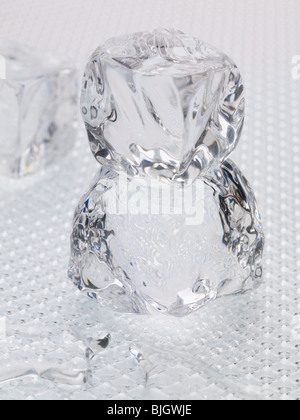 Fusion de trois cubes de glace - Banque D'Images