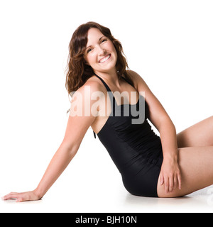 Femme dans un maillot noir Banque D'Images