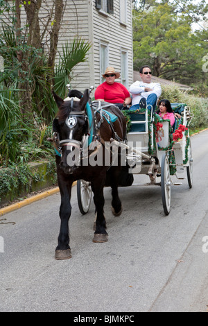 St Augustine, FL - Jan 2009 - Les touristes en visite guidée à cheval à Saint Augustine, Floride Banque D'Images