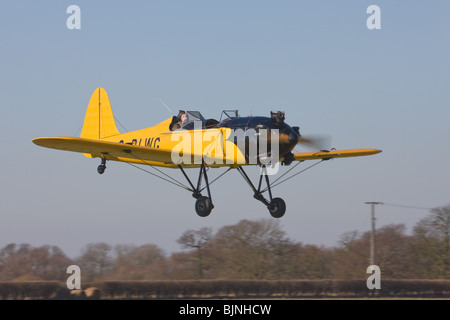 Ryan ST3KR G-RLWG en vol à Breighton Airfield Banque D'Images