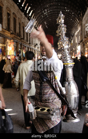 Vendeur d'eau traditionnel à Damas, Syrie Banque D'Images