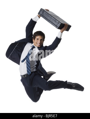 Businessman jumping dans l'air Banque D'Images