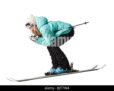 Jeune femme ski, studio shot Banque D'Images
