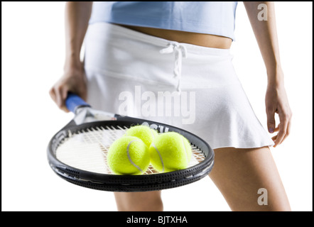 Close-up of tennis player avec des balles et raquettes Banque D'Images