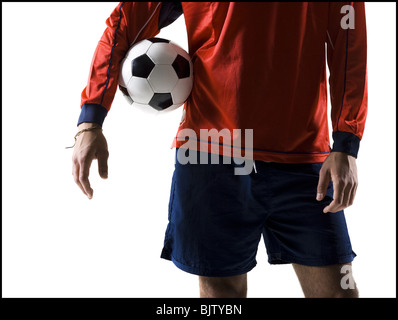 Soccer player with ball Banque D'Images