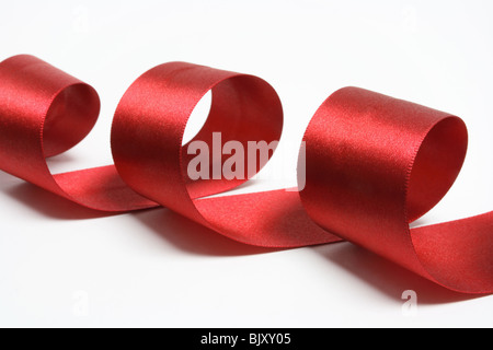 Curling Ruban cadeau rouge Banque D'Images