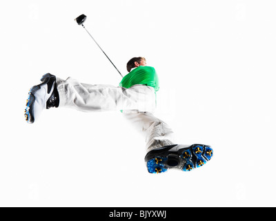 Man playing golf shot Banque D'Images