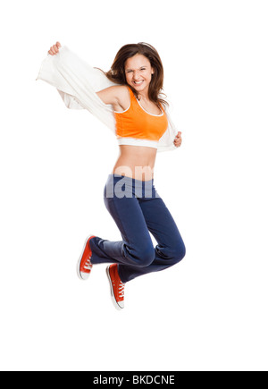 Portrait d'une belle et sportive teenage girl jumping isolated on white Banque D'Images