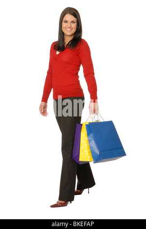 Jolie femme avec des sacs colorés. Banque D'Images