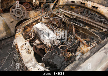 Voiture brûlée à la suite d'incendie fire Banque D'Images