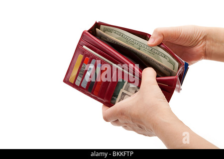 Portefeuille rouge avec de l'argent et une carte de crédit Banque D'Images