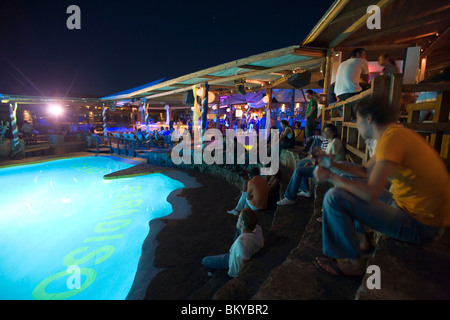 Young people dancing during a beach party at a pool of the Paradise Club,  Paradise Beach, Mykonos, Greece Stock Photo - Alamy