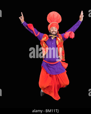 Le Bhangra danse folklorique traditionnelle du Pendjab en Inde du Nord Banque D'Images