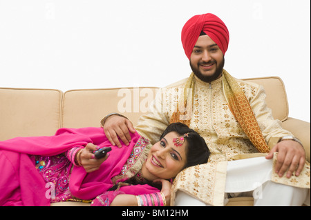 Couple Sikh on a couch Banque D'Images