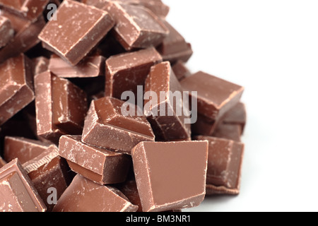 Pièces en chocolat dans une pile avec espace à droite pour copier Banque D'Images