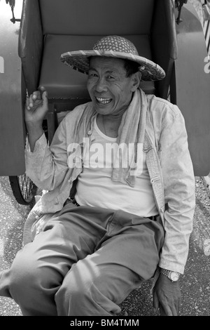 Conducteur de pousse-pousse, le Pic Victoria, Hong Kong, Chine Banque D'Images