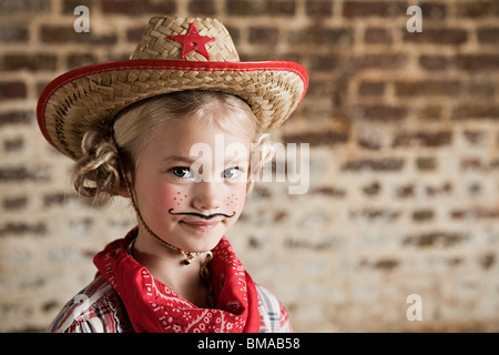 Jeune fille déguisée en cowgirl Banque D'Images