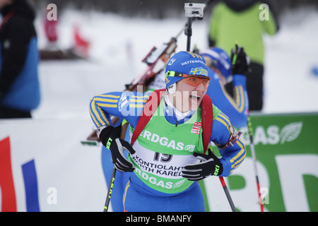 Anna Carin Olofsson-Zidek à terminer la course 10km poursuite femmes IBU World Cup Biathlon Kontiolahti en Finlande le 14 mars 2010 Banque D'Images