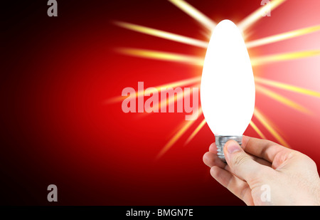 Ampoule dans la main d'un homme Banque D'Images