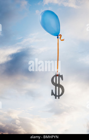 Balloon lié à un symbole du dollar Banque D'Images