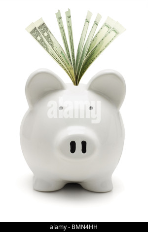 White piggy bank and dollar US sur fond blanc Banque D'Images