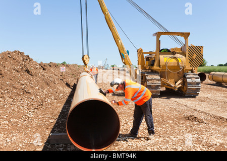 Gazoduc National Grid en cours de pose, vu ici traversant les Cotswolds près d'Elkstone, Angleterre, Gloucestershire Royaume-Uni Banque D'Images
