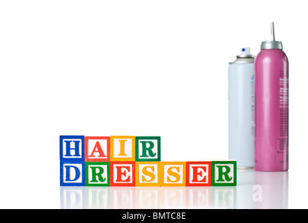 Enfants colorés blocks spelling COIFFEUR avec du fixatif pour les cheveux et la mousse Banque D'Images