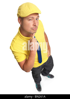Young man looking up at the camera. Isolé sur fond blanc. Banque D'Images