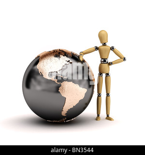 Mannequin de Bois appuyé un grand monde globe montrant l'Amérique du Nord et du Sud Banque D'Images