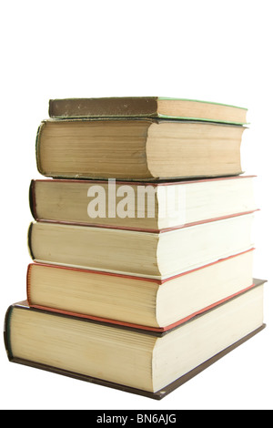 Six livres empilés sur fond blanc Banque D'Images