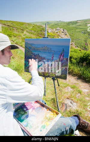 Peinture d'un artiste à l'extérieur sur Zennor Tête dans Cornwall, UK. Banque D'Images