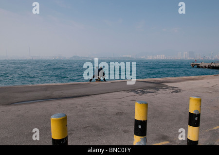 Hong Kong,au port et jetée à l'Ouest sur l'Ile de Hong Kong, Kennedy Town Banque D'Images