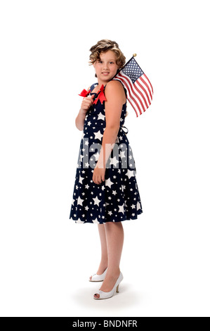 Portrait de jeune fille en studio holding flag Banque D'Images