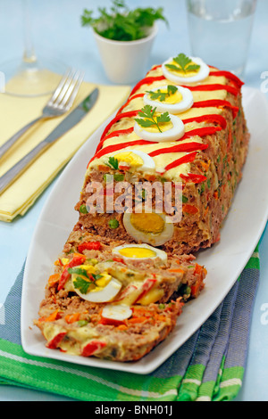 Pâté à la viande avec les légumes. Recette disponible Banque D'Images