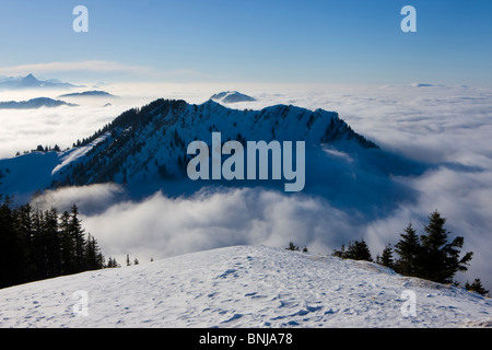 Vue de Kronberg Suisse Canton d'Appenzell Rhodes-Intérieures montagnes vue sur la mer de brume paysage hiver neige firs Banque D'Images