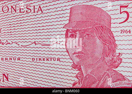 Vintage monnaie indonésienne bank note près, femme en uniforme Banque D'Images
