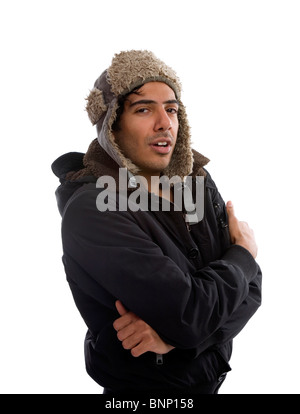 Homme portant un bonnet de laine type aviateur et veste d'hiver Banque D'Images