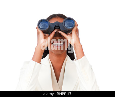 Visionary businesswoman looking through binoculars Banque D'Images