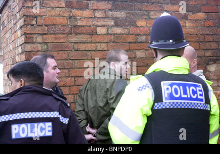 La police arrête un homme UK Banque D'Images