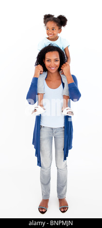 Happy Mother daughter piggyback ride Banque D'Images