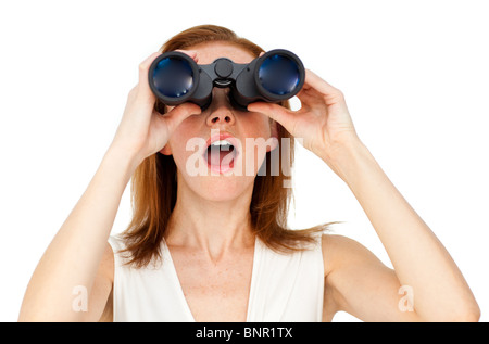 Visionary businesswoman looking through binoculars Banque D'Images