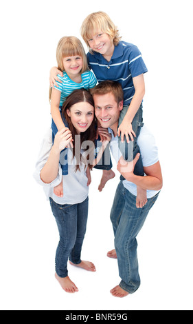 Smiling Family Against A White Background Banque D'Images