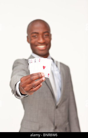 Attractive businessman holding quatre as Banque D'Images