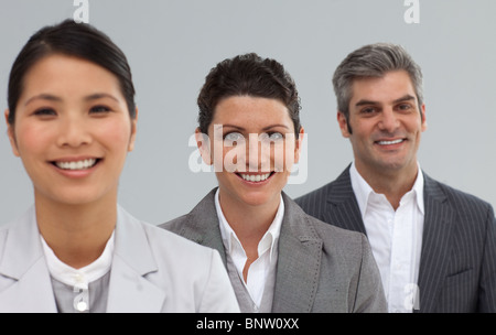 L'équipe commerciale internationale dans une ligne Banque D'Images