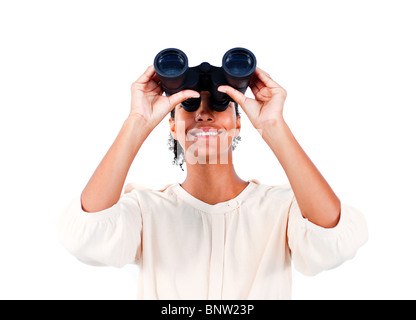 Visionary businesswoman looking through binoculars Banque D'Images