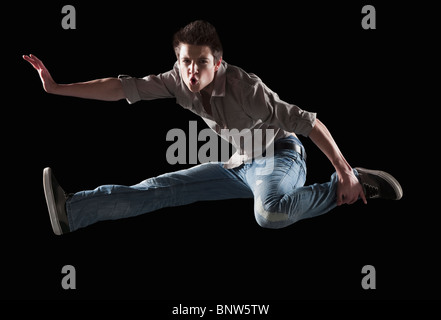 Danseur sautant en l'air Banque D'Images