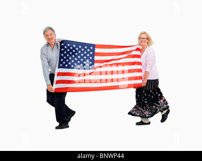 Deux personnes portant le drapeau américain Banque D'Images