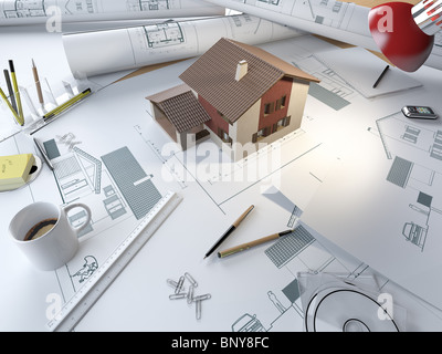 Table à dessin d'architecte avec les plans et modèle 3D d'une maison Banque D'Images