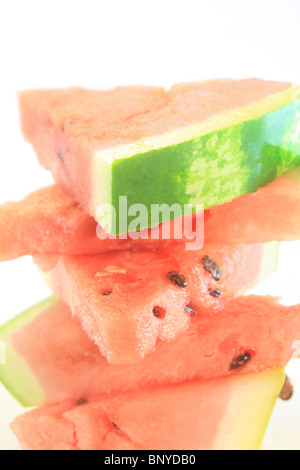 Watermelon coins, en close-up, avec un fond blanc Banque D'Images