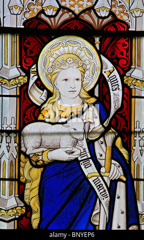 Une fenêtre en vitraux de Geoffrey Webb représentant Saint Agnes tenant un agneau, All Saints Church, Ladbroke, Warwickshire Banque D'Images